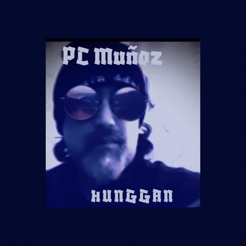 Album cover of 'Hunggan' by PC Muñoz featuring a blue-tinted image of the artist wearing sunglasses and a beanie, with the title 'Hunggan' and artist's name in bold, stylized font.